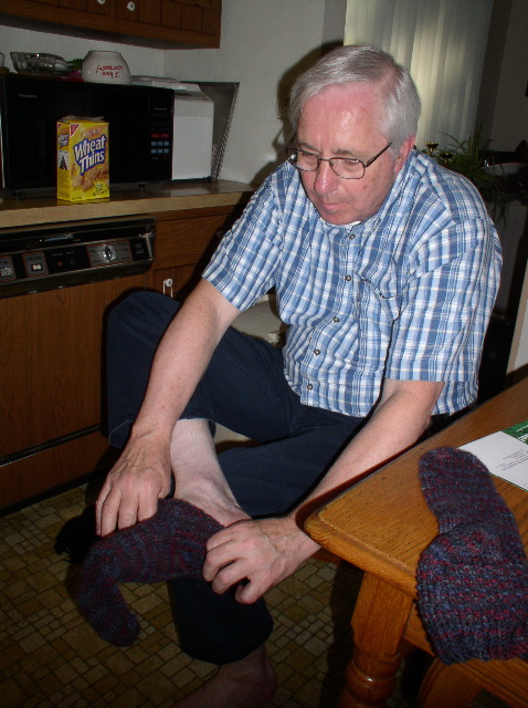 Dad tries on his slippers