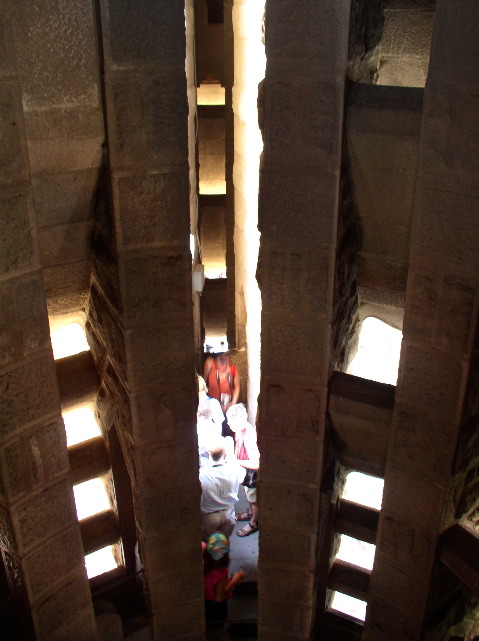 Across the belltower, to a central passage