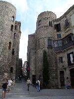 a surviving tower, with building extending into it