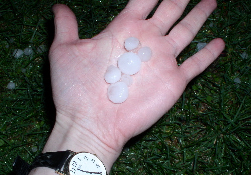 [Several big pieces of hail in my hand]