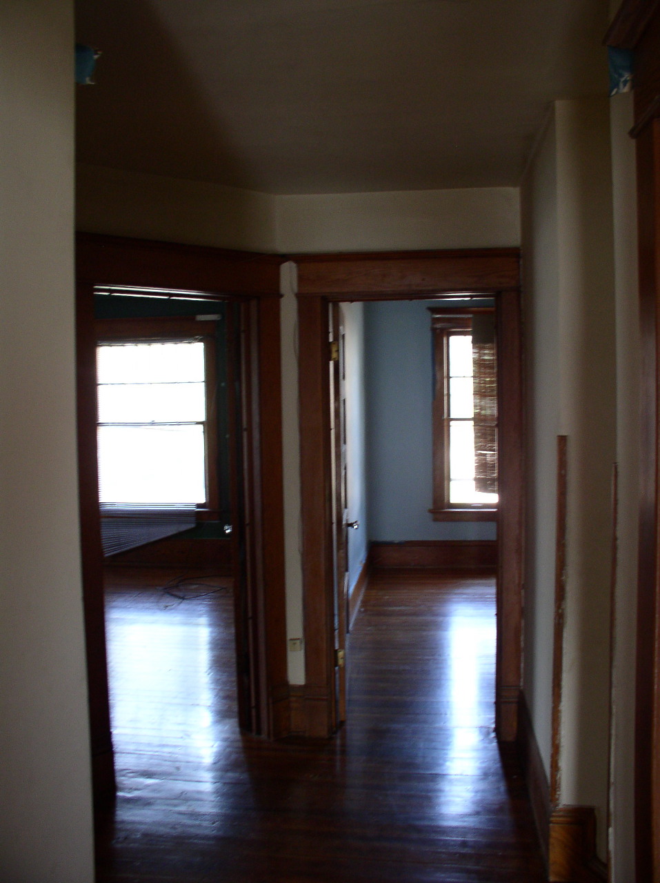 From left to right: jamb of beige bedroom; green bedroom; light blue bedroom; stair.  Not pictured: dark blue bedroom.